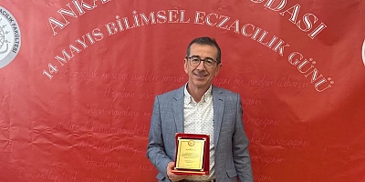 Meslekte 40 yıl plaketi